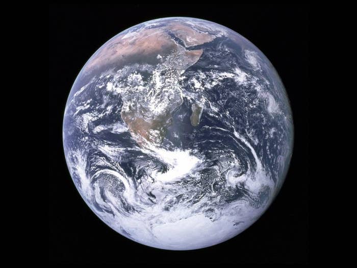 Earth viewed from space, showing continents and clouds