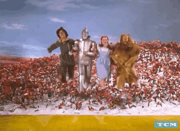 Dorothy, Tin Man, Scarecrow, and Cowardly Lion on the Yellow Brick Road in &quot;The Wizard of Oz.&quot;