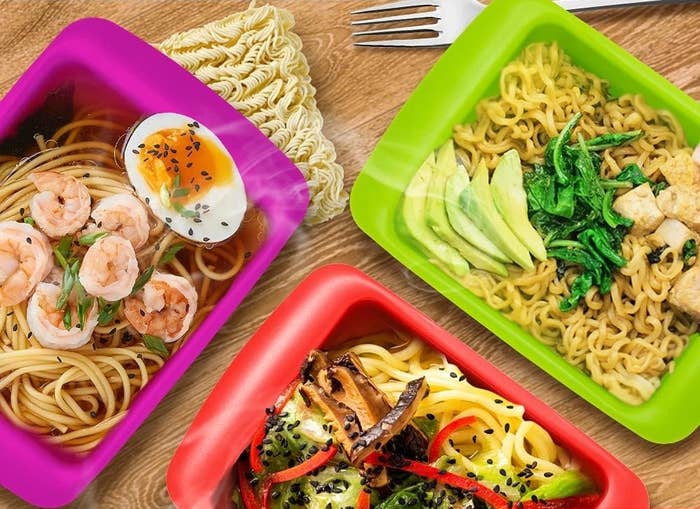 Various noodle dishes with toppings in colorful Rapid Ramen cookers