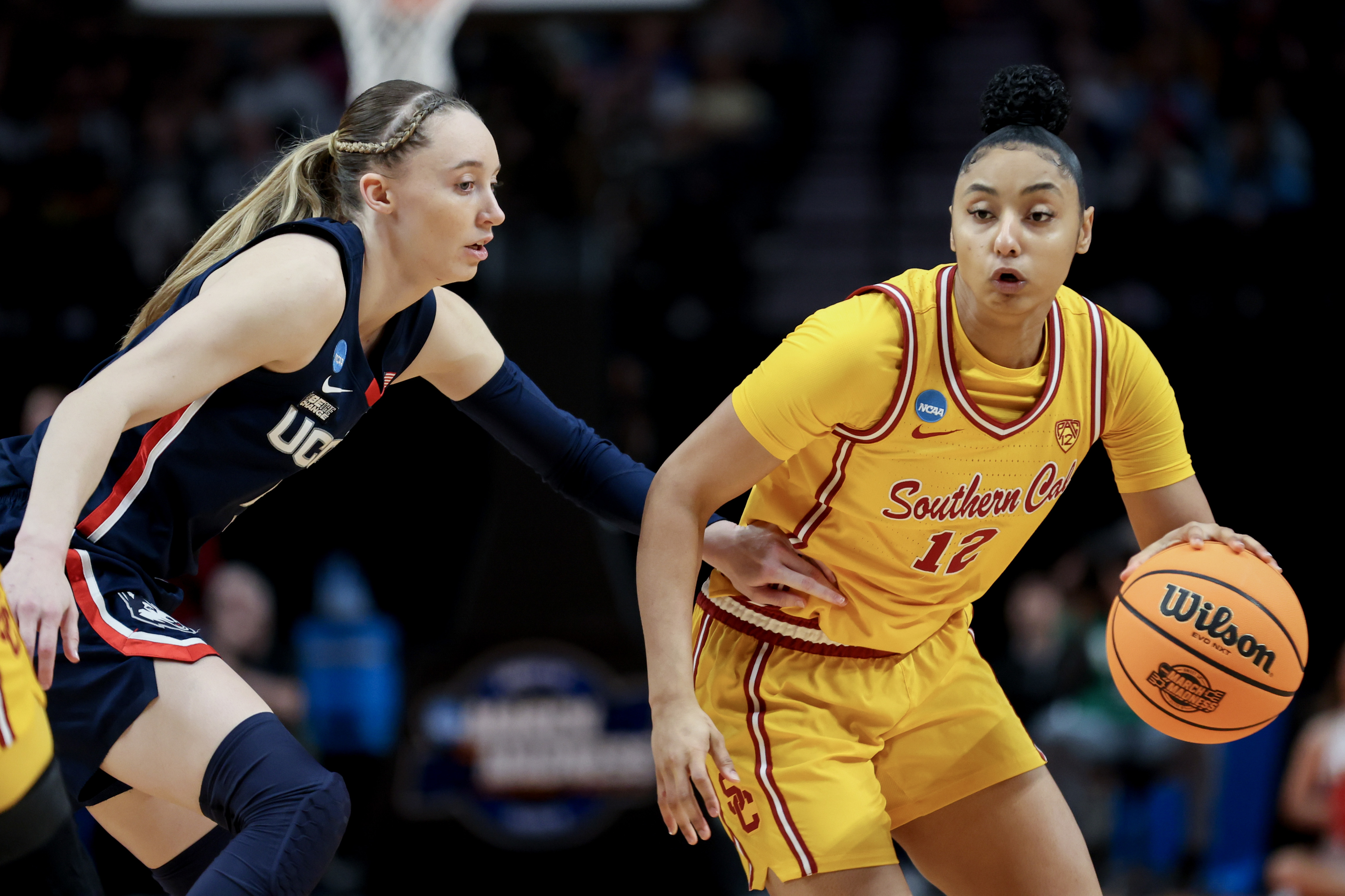 Paige Bueckers and JuJu Watkins playing against each other