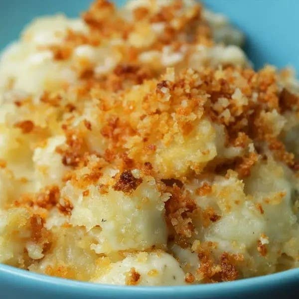 Close-up of a dish of macaroni and cheese with a breadcrumb topping