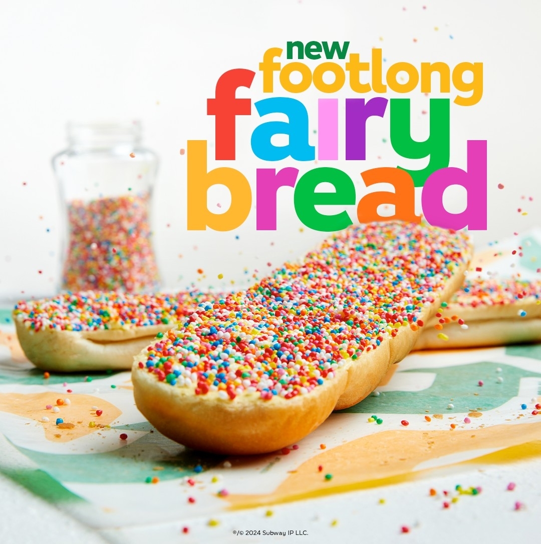 Advertisement for Subway&#x27;s new footlong fairy bread, sprinkled with colorful nonpareils on a white surface