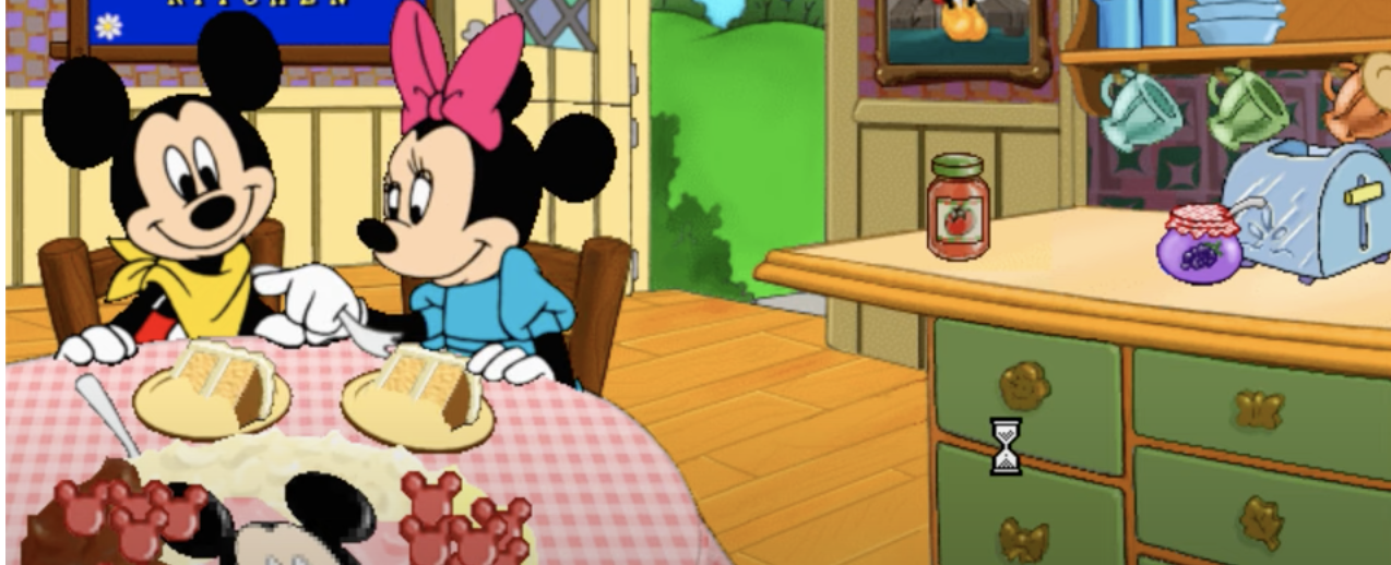 Mickey and Minnie Mouse sitting at a table with cake in a cartoon kitchen
