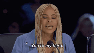 Tyra Banks wearing a buttoned jacket, expressing admiration with the caption &quot;You&#x27;re my hero.&quot;