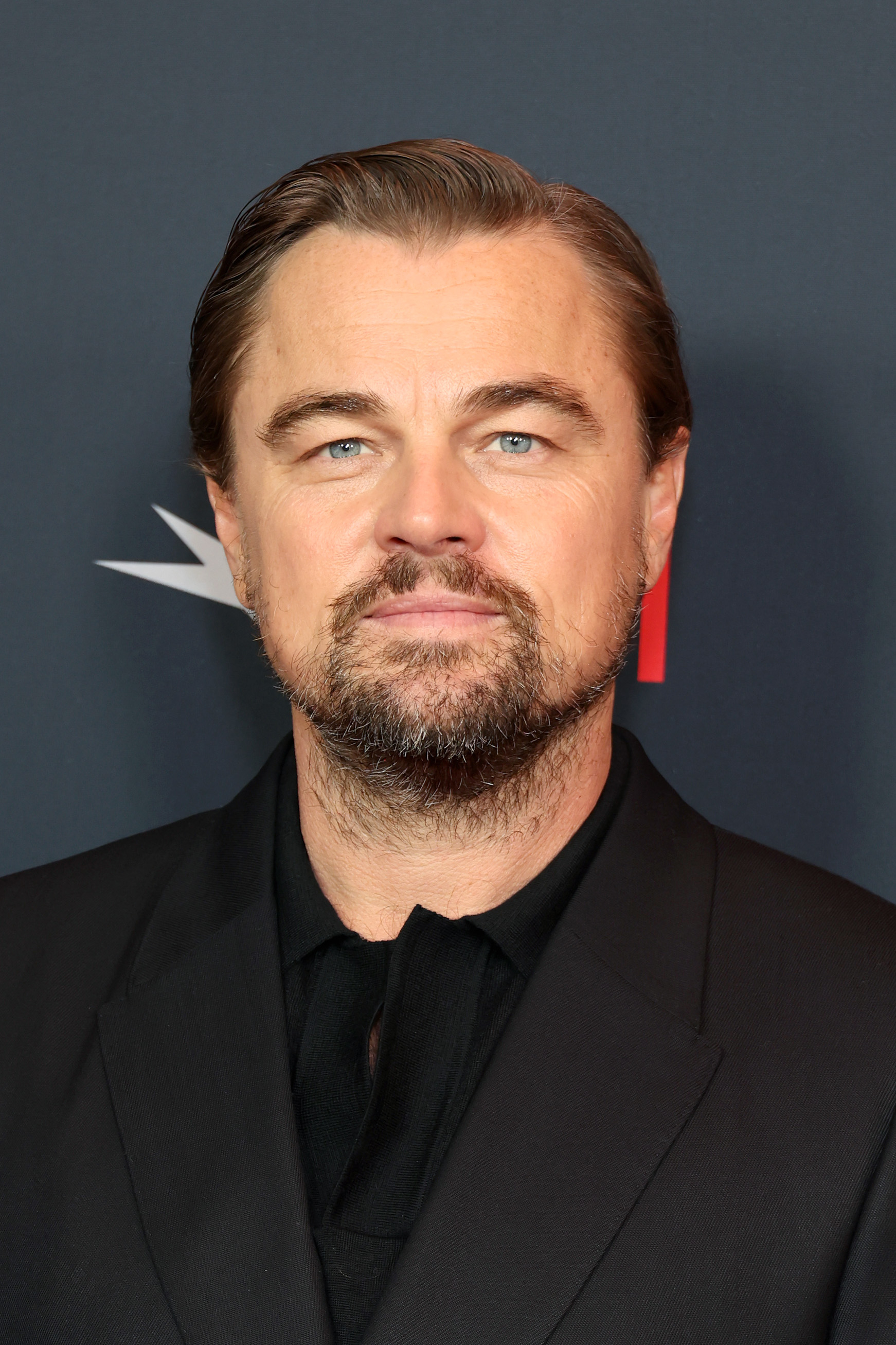 Leonardo DiCaprio in a suit at an event