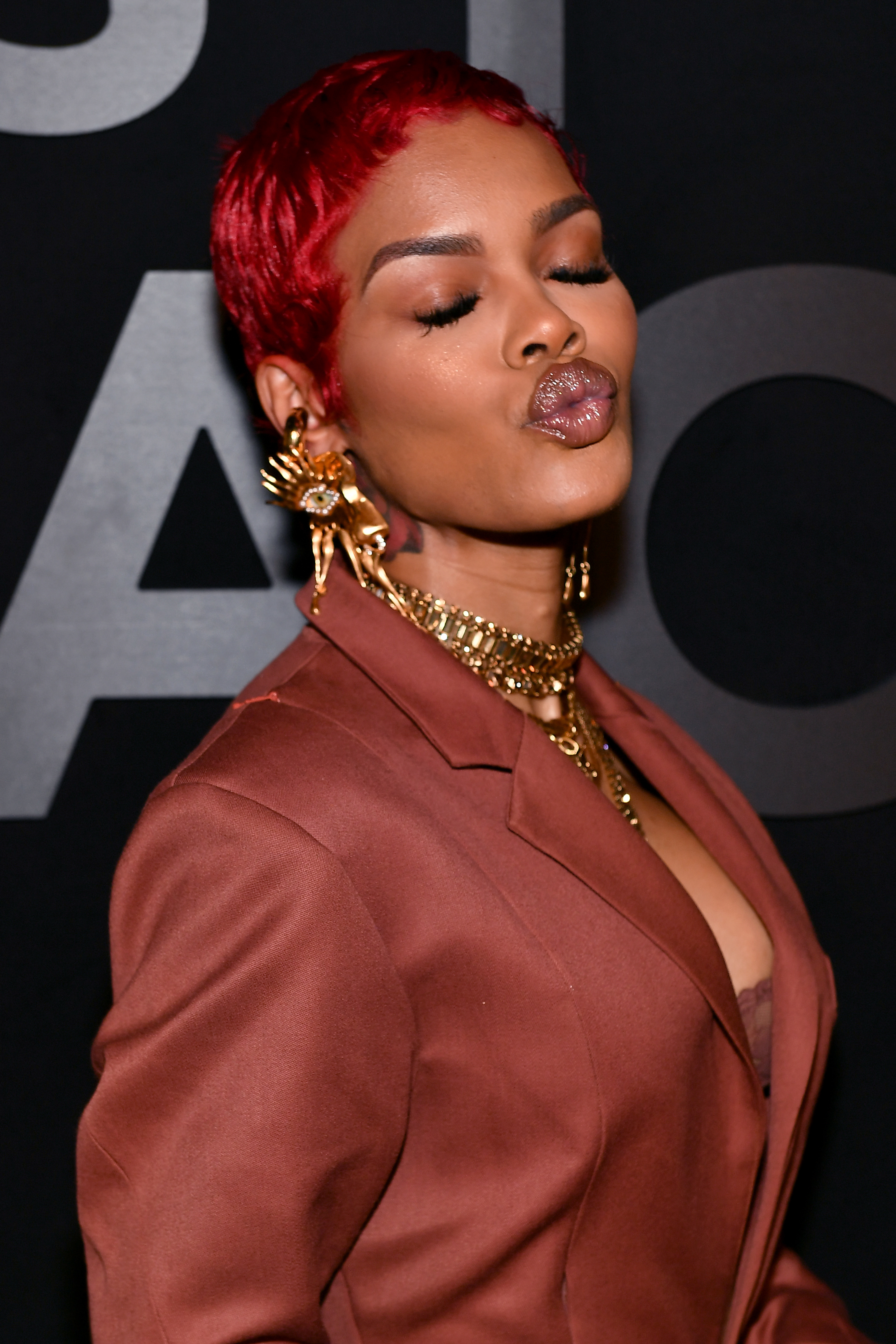 Closeup of Teyana Taylor pursing her lips as if giving a kiss to the camera