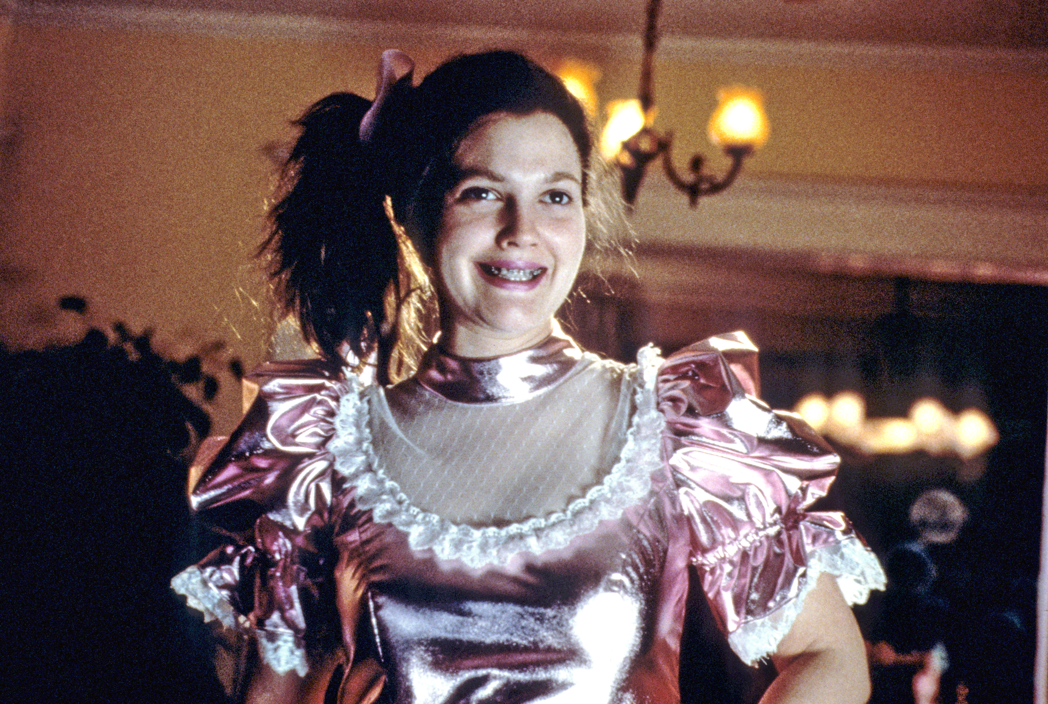 Drew Barrymore in a Victorian-style pink dress with puffed sleeves, as seen in the movie &#x27;Never Been Kissed&#x27;