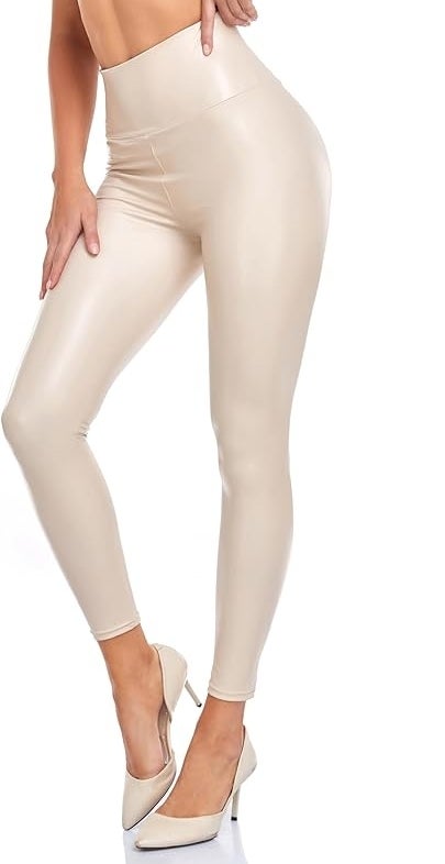 Woman models beige high-waisted leggings with heels, focus on fit and style for shopping context