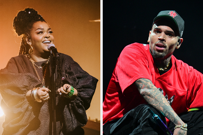 Two singers performing on stage, Jill Scott in a draped top and Chris Brown in a red sporty outfit