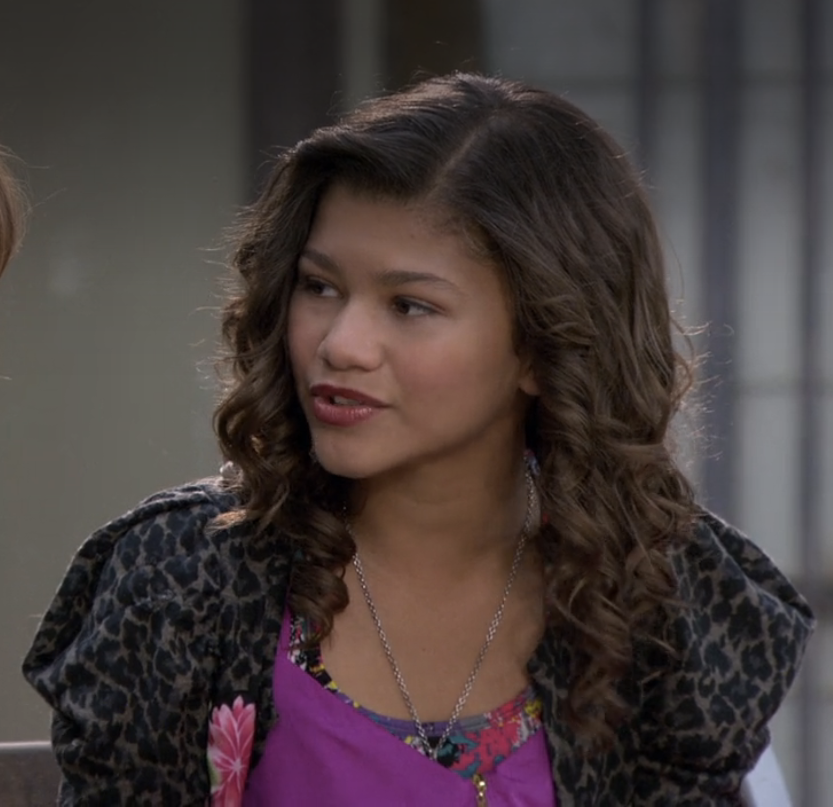 Zendaya, in patterned jacket over bright top, with wavy hair, on &quot;Shake It Up&quot;