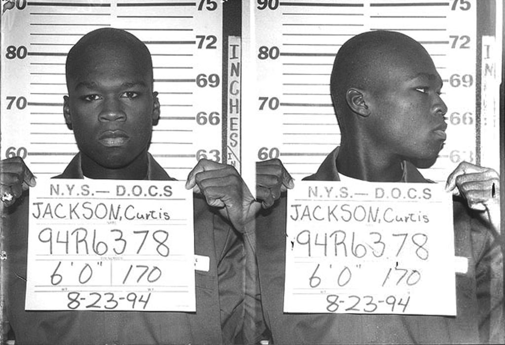 Mugshot of a man, side and front view, with a placard displaying name Curtis Jackson and numbers