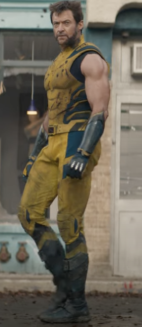 Wolverine in a battle-ready stance wearing his signature yellow and black suit