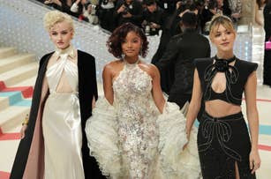 Julia Garner, Halle Bailey, and Daisy Edgar-Jones in glamorous dresses at a formal event, with unique necklines and embellishments