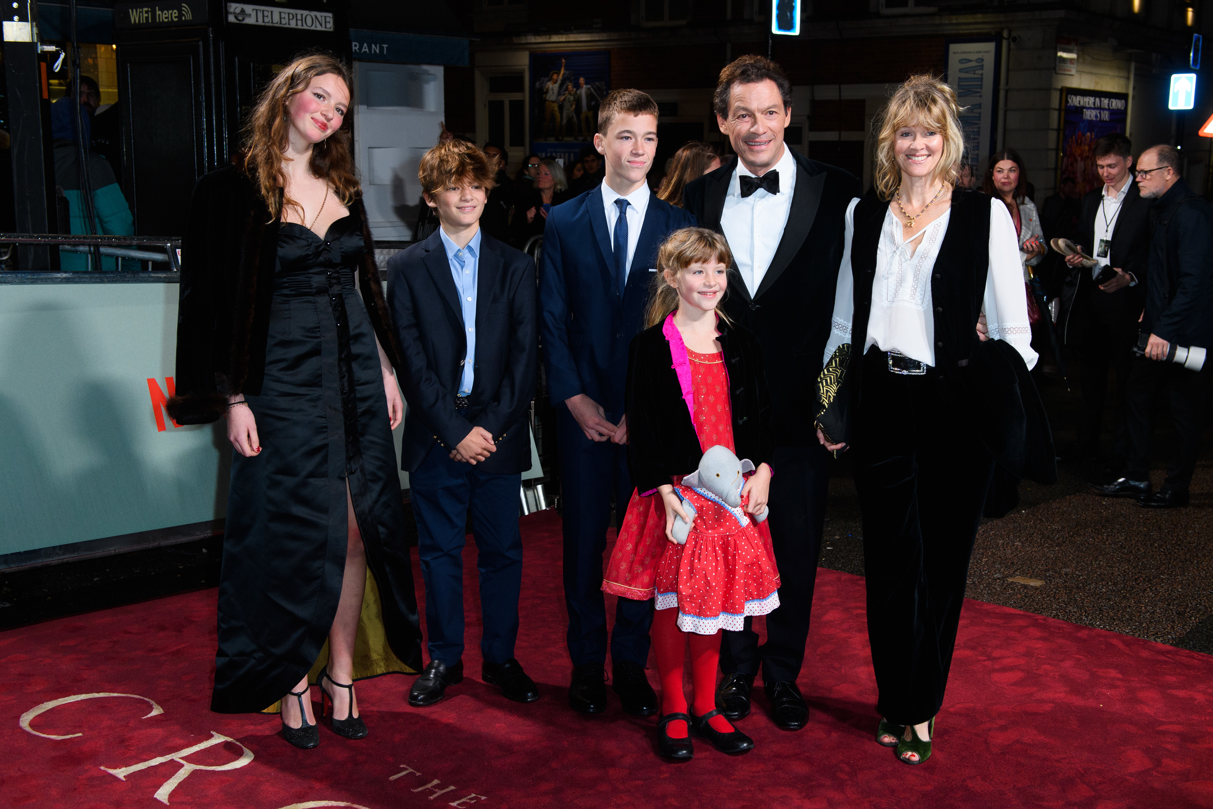 Dominic with his family on the red carpet