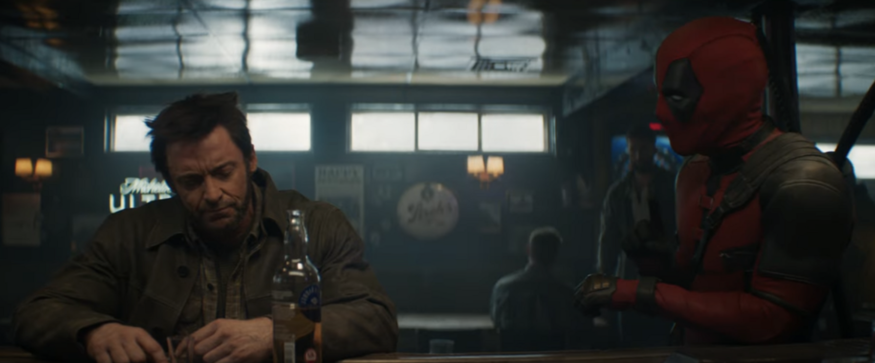 Deadpool sits at a bar next to Wolverine