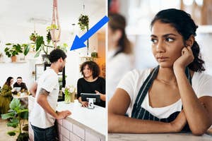 Woman listening intently at a cafe counter; another person stands with back to camera