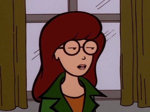 Daria Morgendorffer from the animated series &quot;Daria&quot; with a neutral expression, wearing glasses and a green jacket