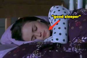 A scene from a film with a text overlay saying "good sleeper" pointing at a character in bed, implying she is sleeping well