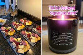 Image of an assortment of cheeses and fruits on a board next to a lit soy candle with the text "TikTok-beloved 'signature scent'"