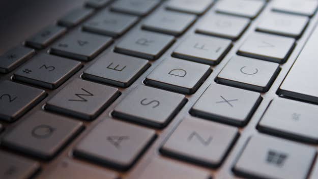 Close-up of a QWERTY keyboard focusing on the center keys