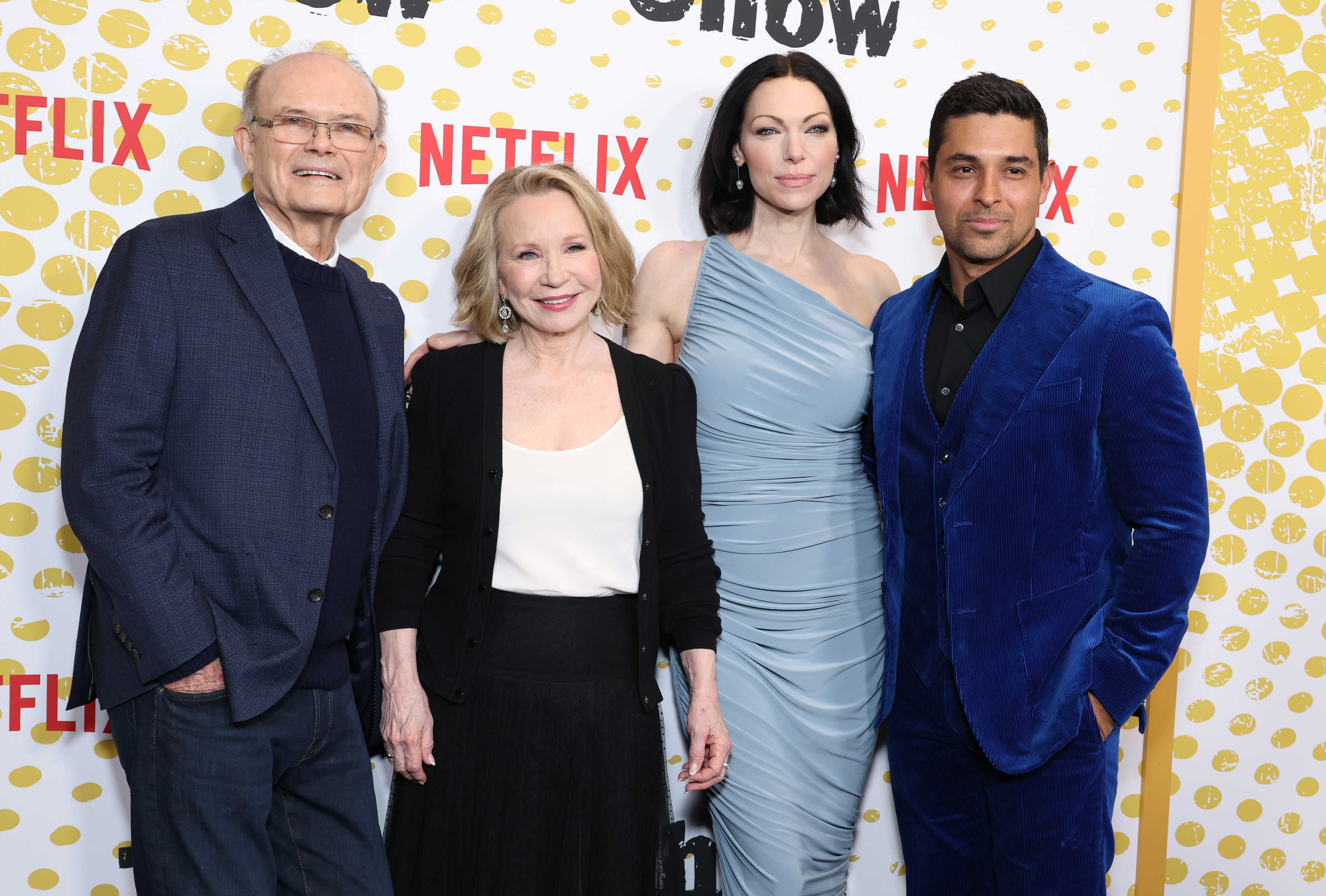 Kurtwood Smith, Debra Jo Rupp, Laura Prepon, and Wilmer Valderrama stand together for a red carpet photo