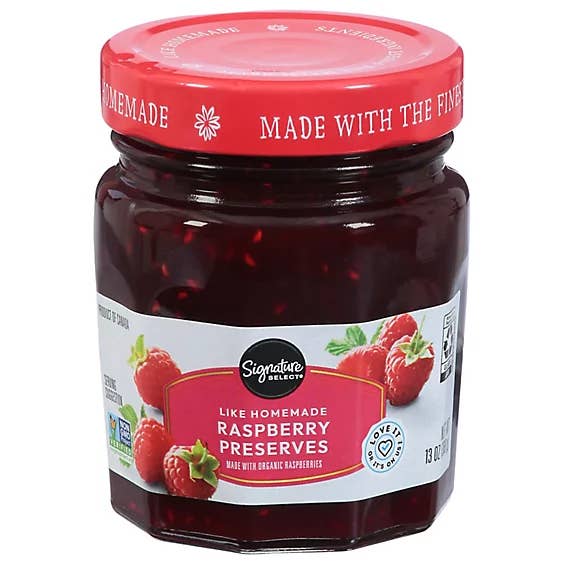 Jar of Signature Select Raspberry Preserves on a white background
