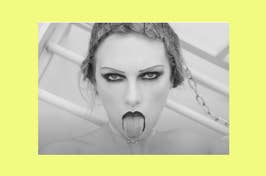 Taylor Swift with dramatic makeup sticking out tongue in Fortnight music video