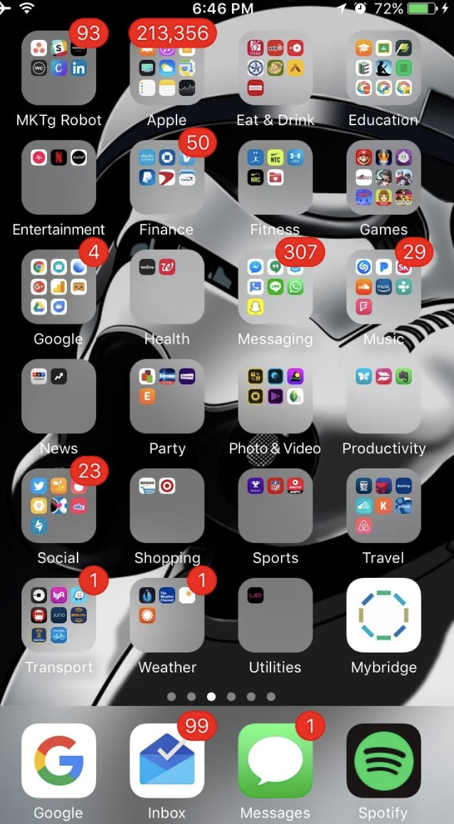 Smartphone screen with various app notifications, such as messages and emails, indicating unread items