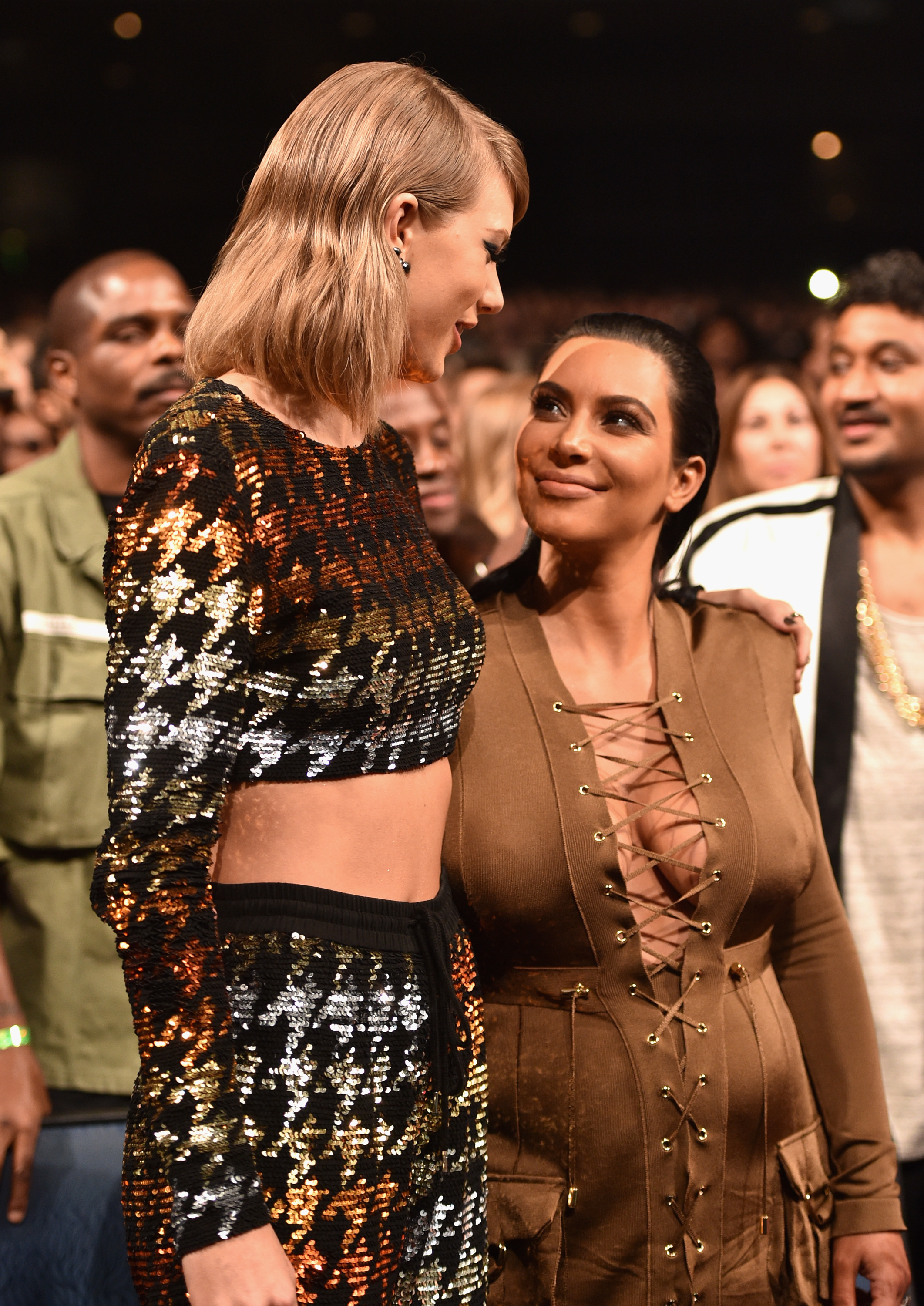 Closeup of Taylor Swift and Kim Kardashian at an event