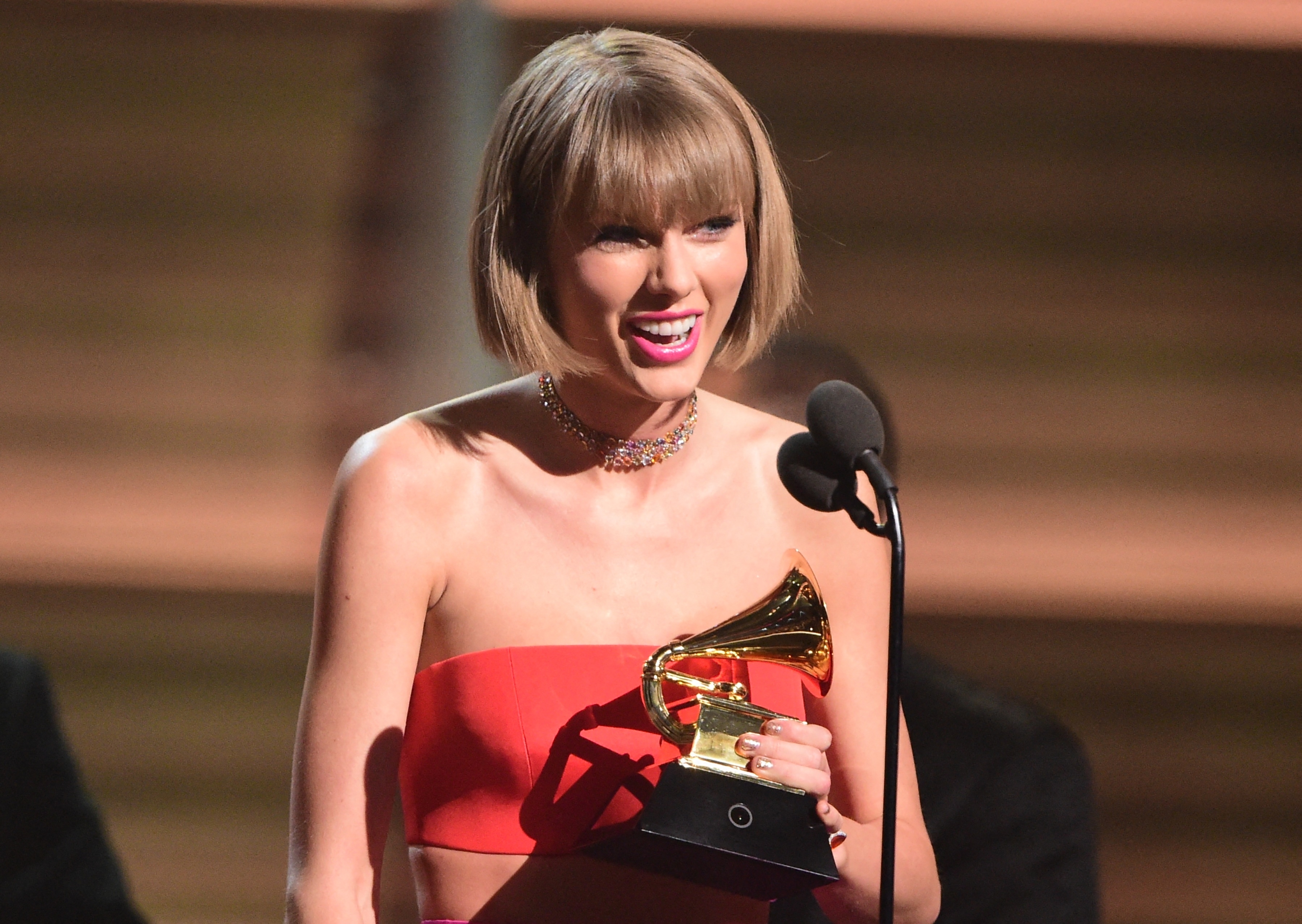Closeup of Taylor Swift accepting a Grammy award