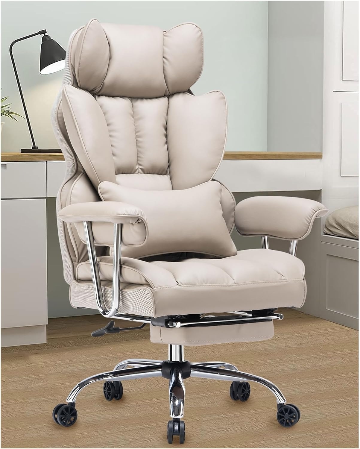 Ergonomic office chair with padded headrest and armrests in a home office setup