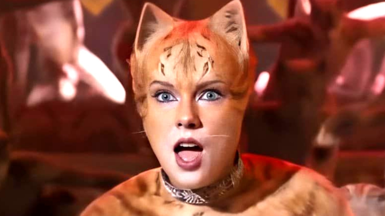 Taylor Swift in &quot;Cats&quot; film, dressed as a cat with digital fur, wide-eyed expression
