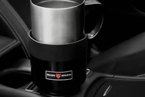 Travel mug with logo in car cup holder, featured for shopping article