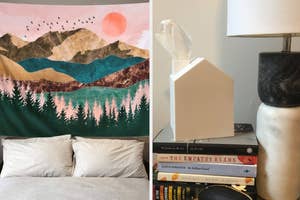 Tapestry with mountain landscape above a bed, and a nightstand with a lamp and books, featuring a tissue box cover