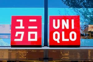 Storefront of UNIQLO with logo above entrance