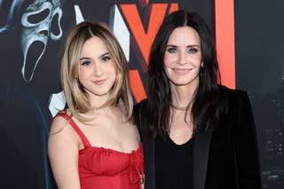 Courteney Cox in a turtleneck and her daughter Coco Arquette in a red dress at an event