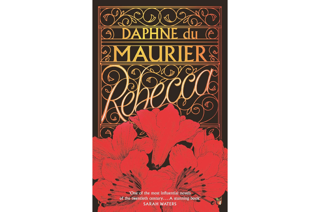 Book cover of &quot;Rebecca&quot; by Daphne du Maurier with large red flowers and ornate title text