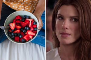 Person holding bowl of berries; Sandra Bullock with a contemplative expression