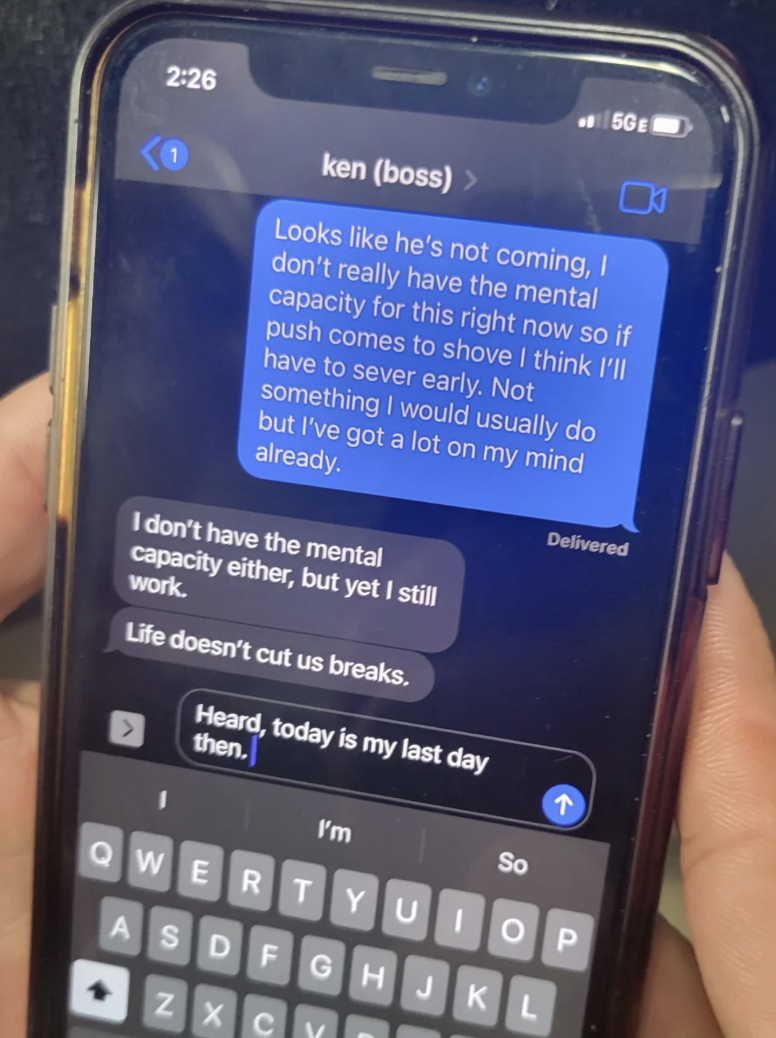 Text messages on a phone screen discussing someone&#x27;s inability to handle additional work due to mental capacity