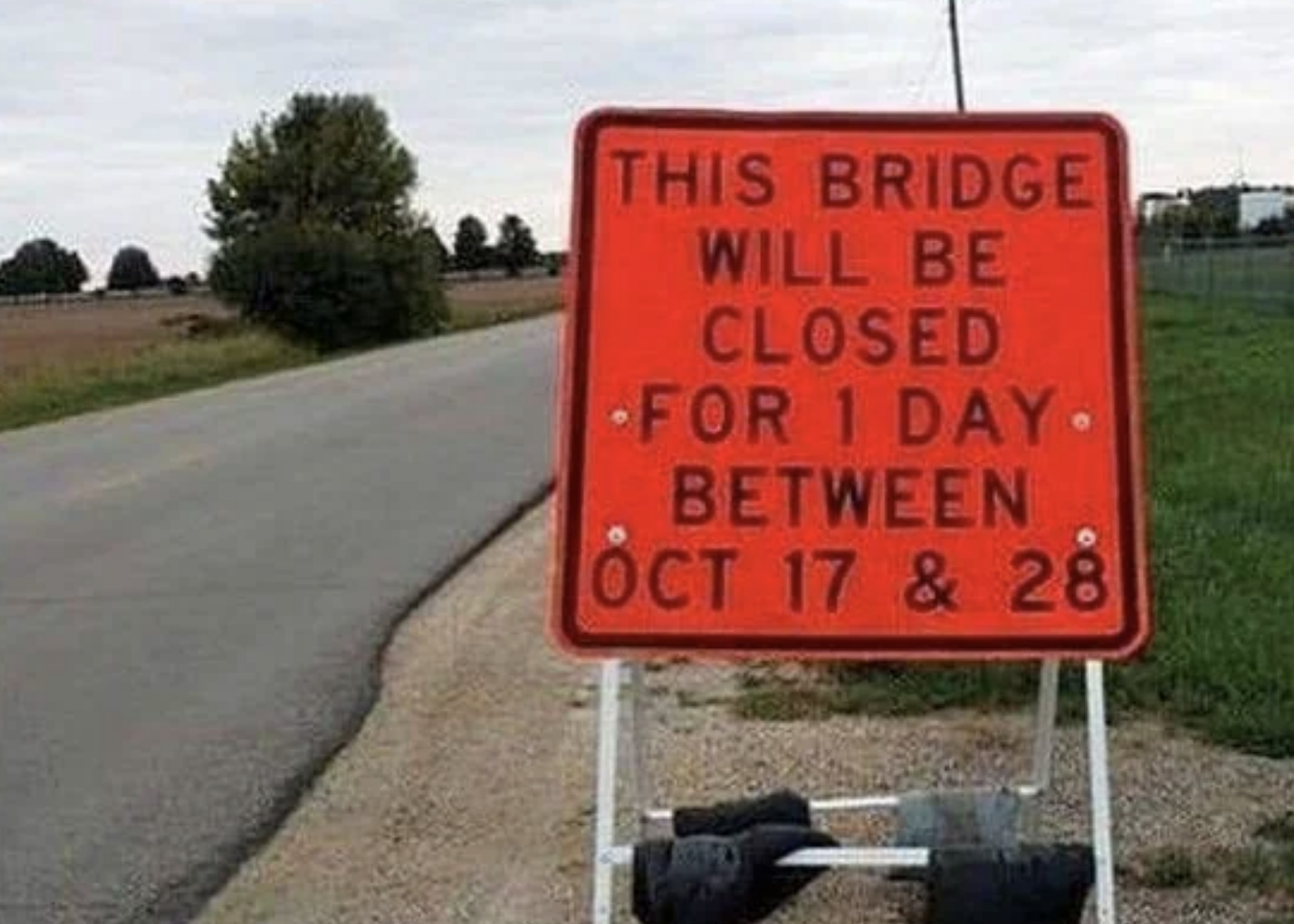 Sign announcing bridge closure for one day between October 17 and 28