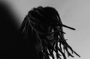 Silhouetted profile of person with dreadlocks against a dark background, text promoting "head.rap 024" featuring artists