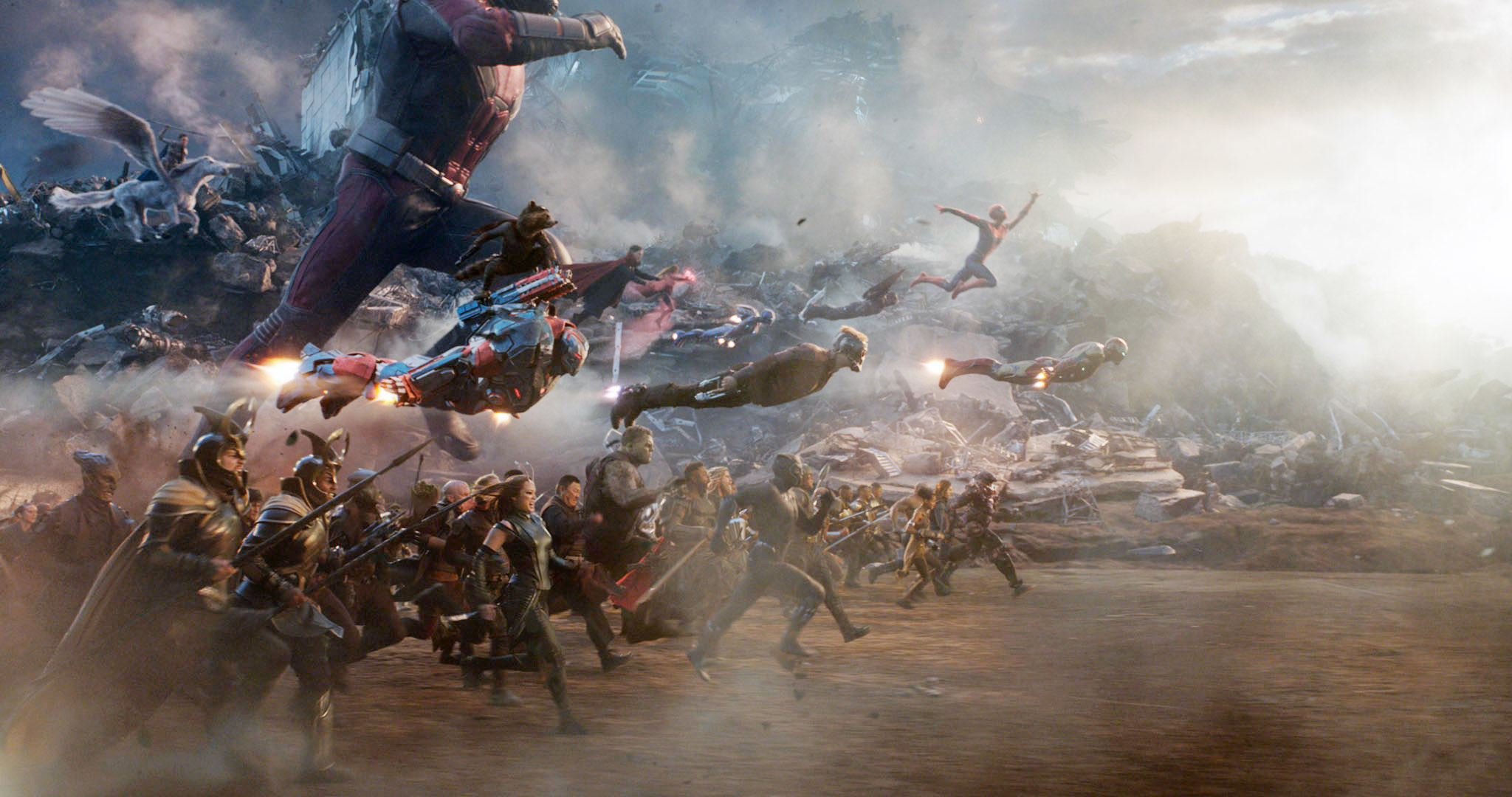 Battle scene with superheroes like Iron Man flying and ground troops advancing
