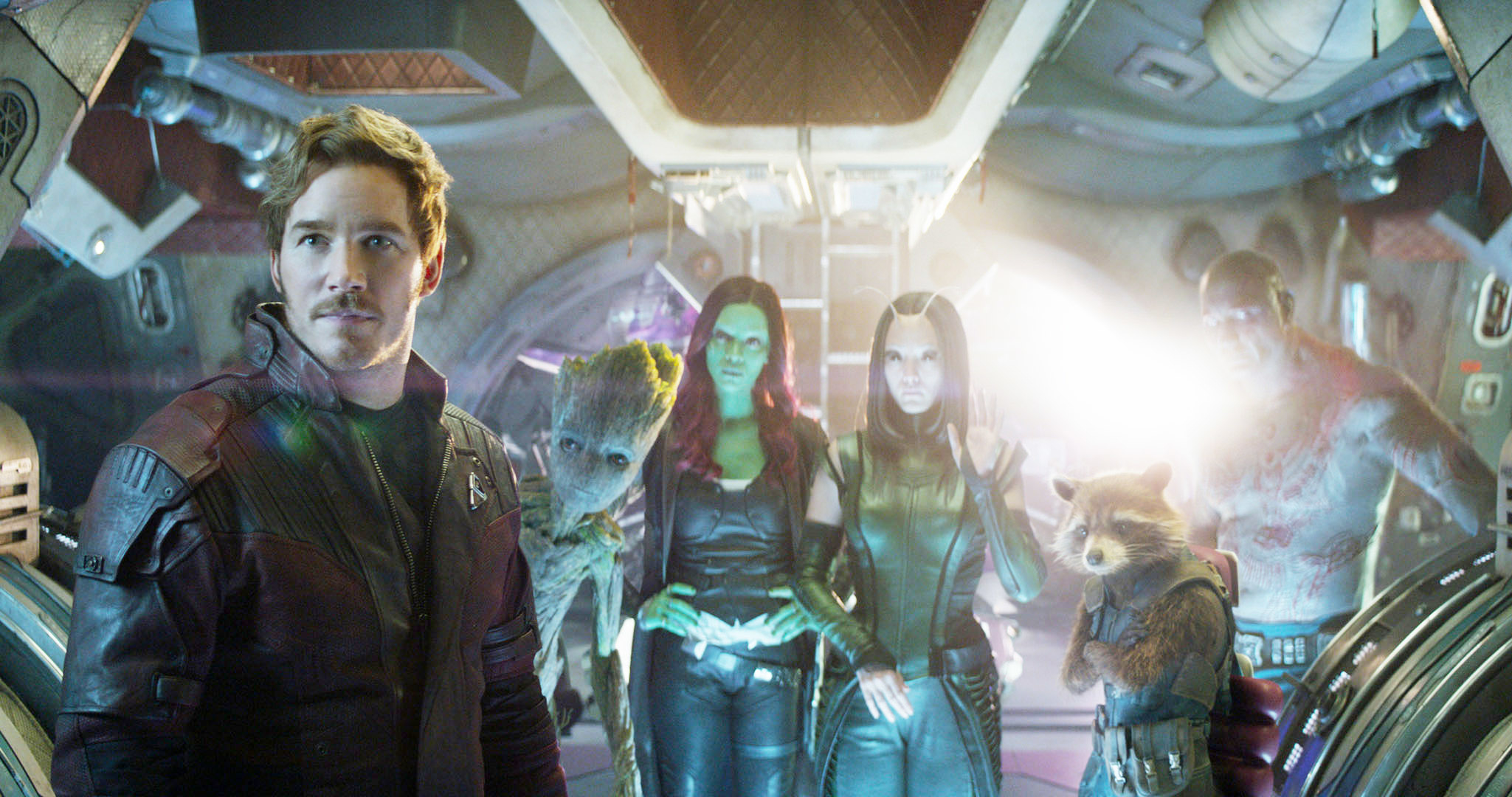 Star-Lord, Gamora, Groot, Drax, and Rocket standing in the Milano spaceship from Guardians of the Galaxy
