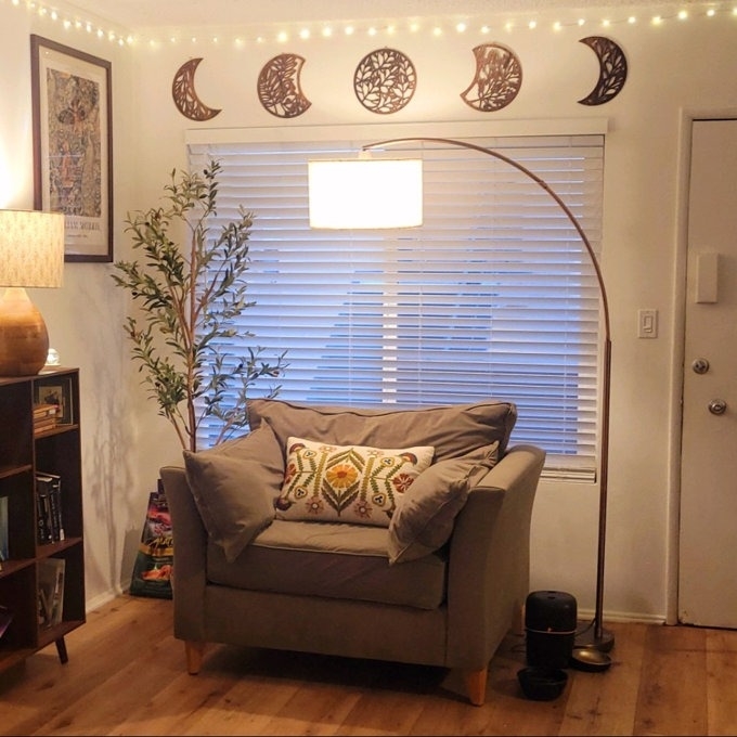 The lamp over a cozy reading nook.