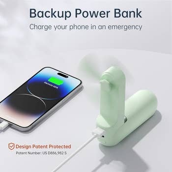 Phone connected to a portable backup power bank/fan for emergency charging