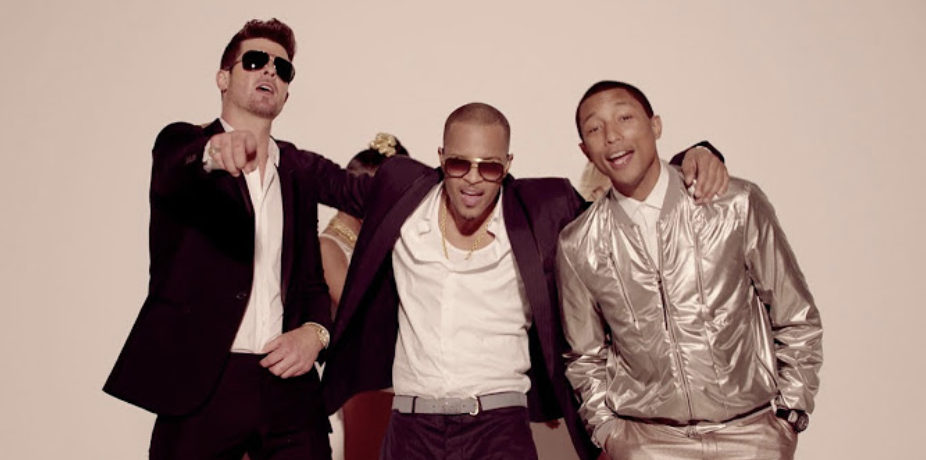 Robin Thicke, T.I., and Pharrell Williams in a music video, styled in smart casual and metallic jackets