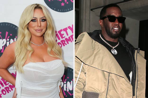 Aubrey O'Day poses in a white dress while Sean Combs wears a puffy jacket and shades