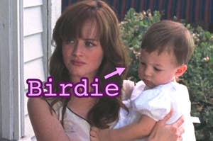 Rory Gilmore holding a baby that has an arrow pointing towards it with the word "Birdie."