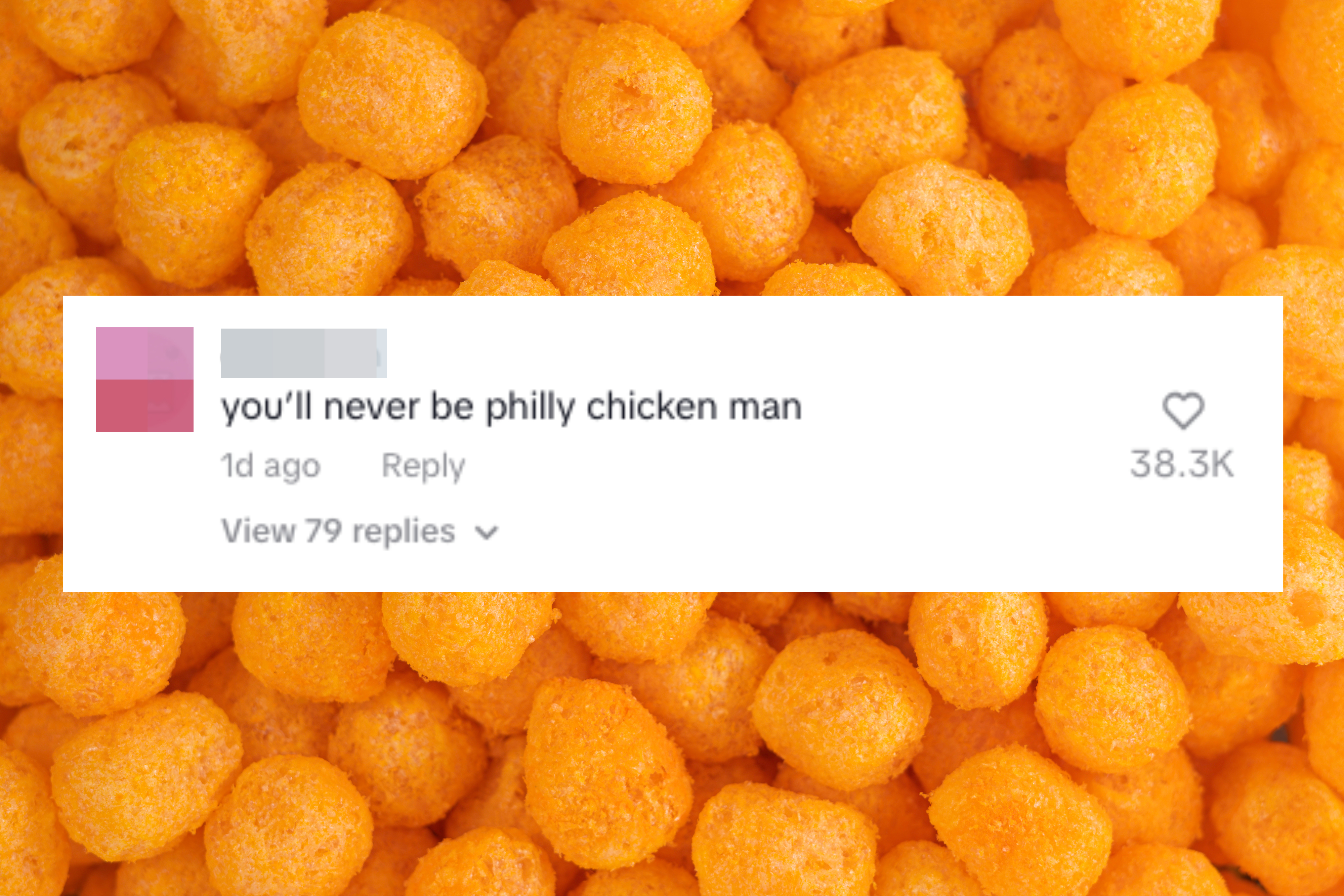 Numerous orange cheese puffs in close-up view