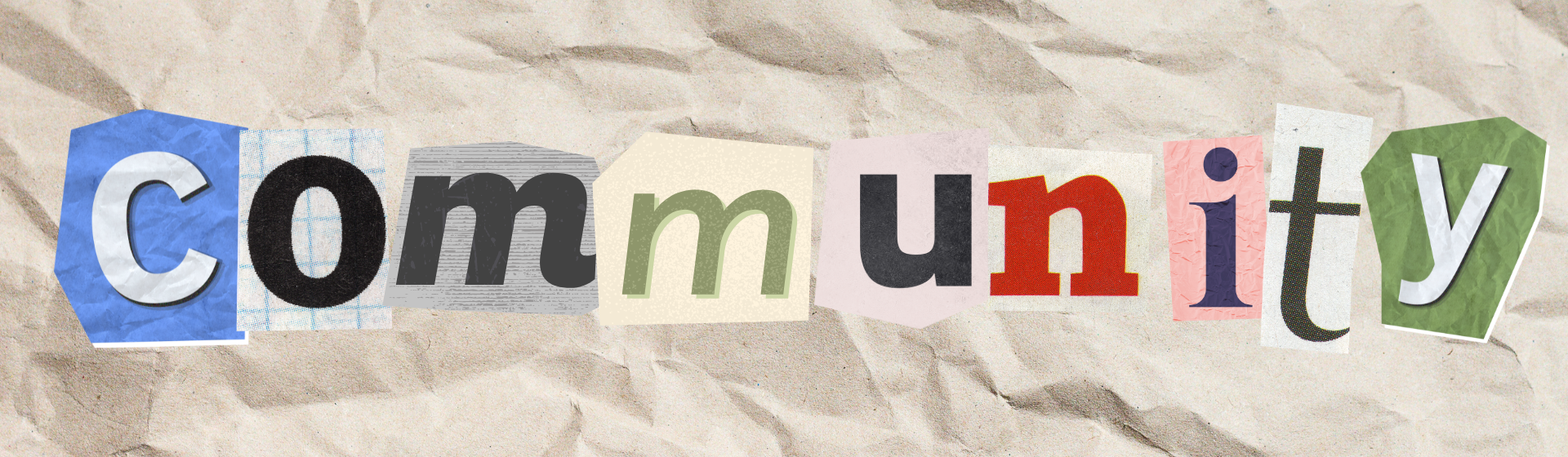 The word "Community" cut from various sources and pasted on crumpled paper